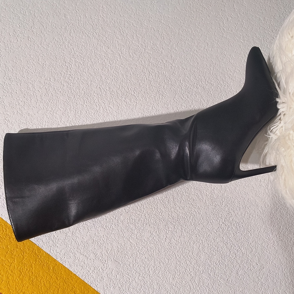 Women's high heeled boots.